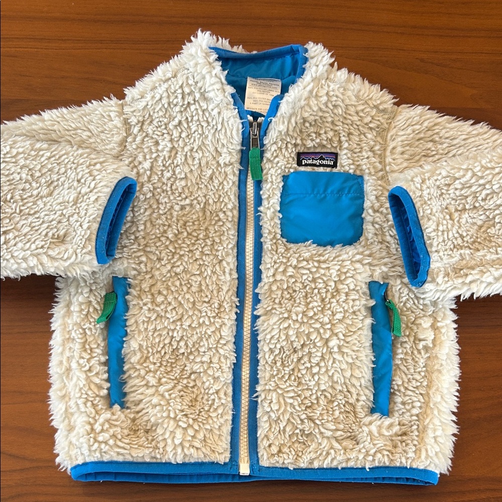 PATAGONIA TODDLER-Retro-X Jacket in cream with blue trim and green accents. 3T
